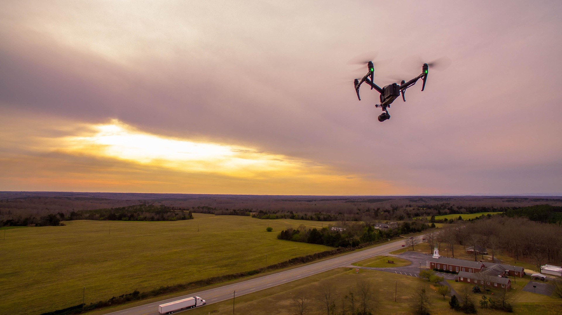 Body-Pose-Guided Action Recognition with Convolutional Long Short-Term Memory (LSTM) in Aerial Videos